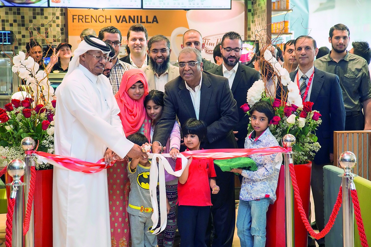 Dignitaries cutting the ribbon to inaugurate Tim Hortons Café at Ezdan Mall, Al Wakrah.