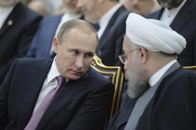 File photo of Russian President Vladimir Putin and his Iranian counterpart Hassan Rouhani attending a signing ceremony in Tehran (Reuters / Alexei Druzhinin / Sputnik / Kremlin) 
