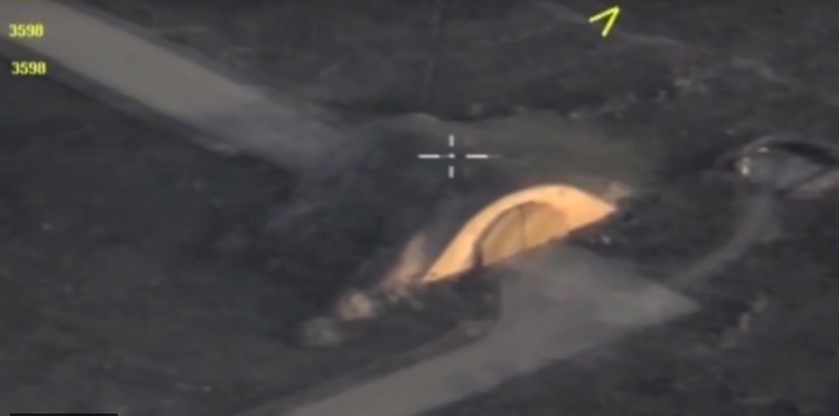 A handout grab image made on April 8, 2017 from a video made available by the Russian Defence Ministry's press service on the official website of the Russian Defence Ministry shows landing and strips at the Shayrat airbase after it was hit by US strike.  