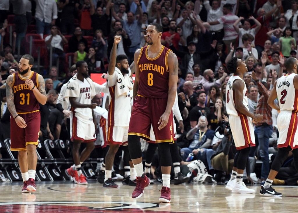Cleveland Cavaliers forward Channing Frye (8) react after Miami Heat players celebrate their 124-121 overtime win at American Airlines Arena. The Heat won 124-121 in overtime. Steve Mitchell
