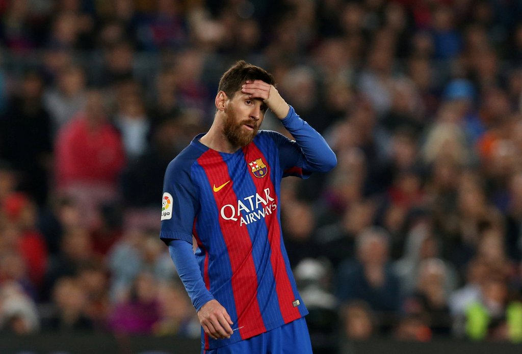 Barcelona's Lionel Messi reacts against Real Sociedad. REUTERS/Albert Gea
