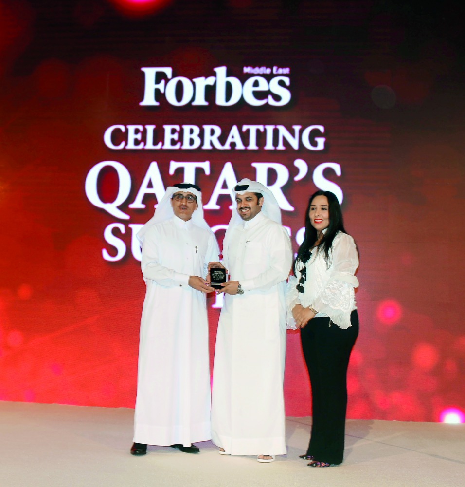 GWC officials receiving 'Qatar Success Award', at the St. Regis Hotel in Doha yesterday.

