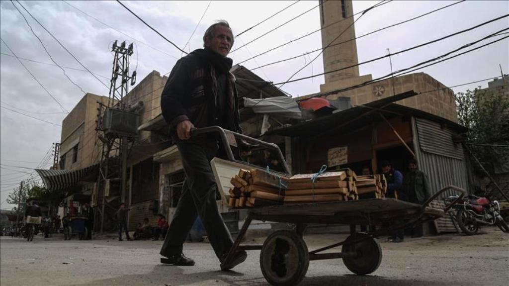People living in Eastern Goutha are seen as they try live in hard conditions during civil war, in Damascus, Syria on April 18, 2017. ( Amer Almohibany - Anadolu Agency ).