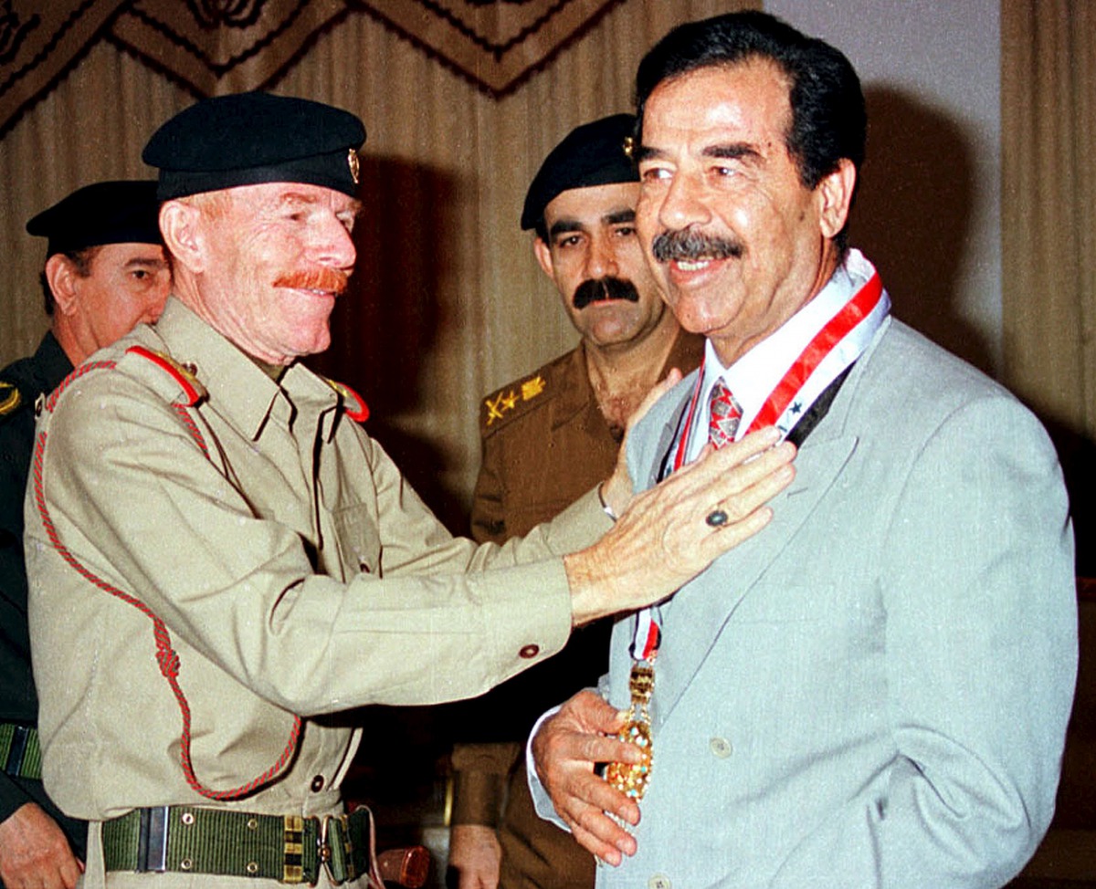 Ezzat al-Douri, an aide of former Iraqi President Saddam Hussein, is seen with Saddam in this undated file photo (REUTERS) 