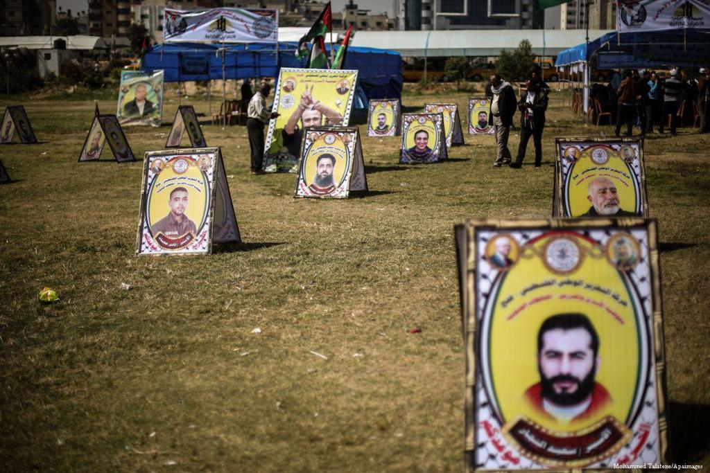 Placards are placed during a demonstration in support of Palestinians who are on hunger strike in Israeli prisons, at Saraya Square in Gaza City, Gaza on April 19, 2017 [Mohammed Talatene/Anadolu Agency].