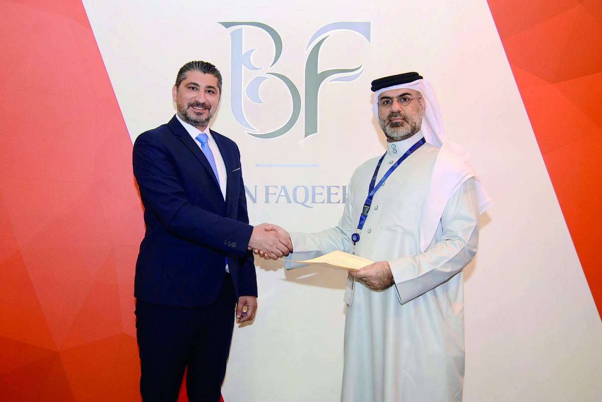 Mohamad Doughan (left), Business Development Director of TLN Qatar with Faisal Faqeeh, Chairman of Bin Faqeeh Real Estate Investment Co. at the signing ceremony. 
