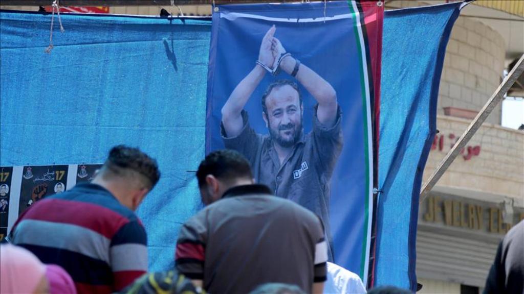 FILE PHOTO -Photo of prisoned Palestinian lawmaker Marwan Barghouti seen on the banner.