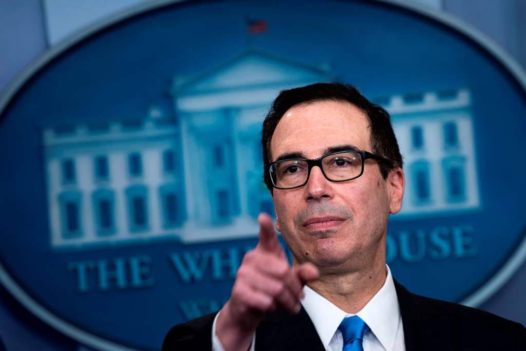 US Secretary of the Treasury Steven Mnuchin takes questions after announcing sanctions against Syria during a briefing at the White House April 24, 2017 in Washington, DC. / AFP / Brendan Smialowski
