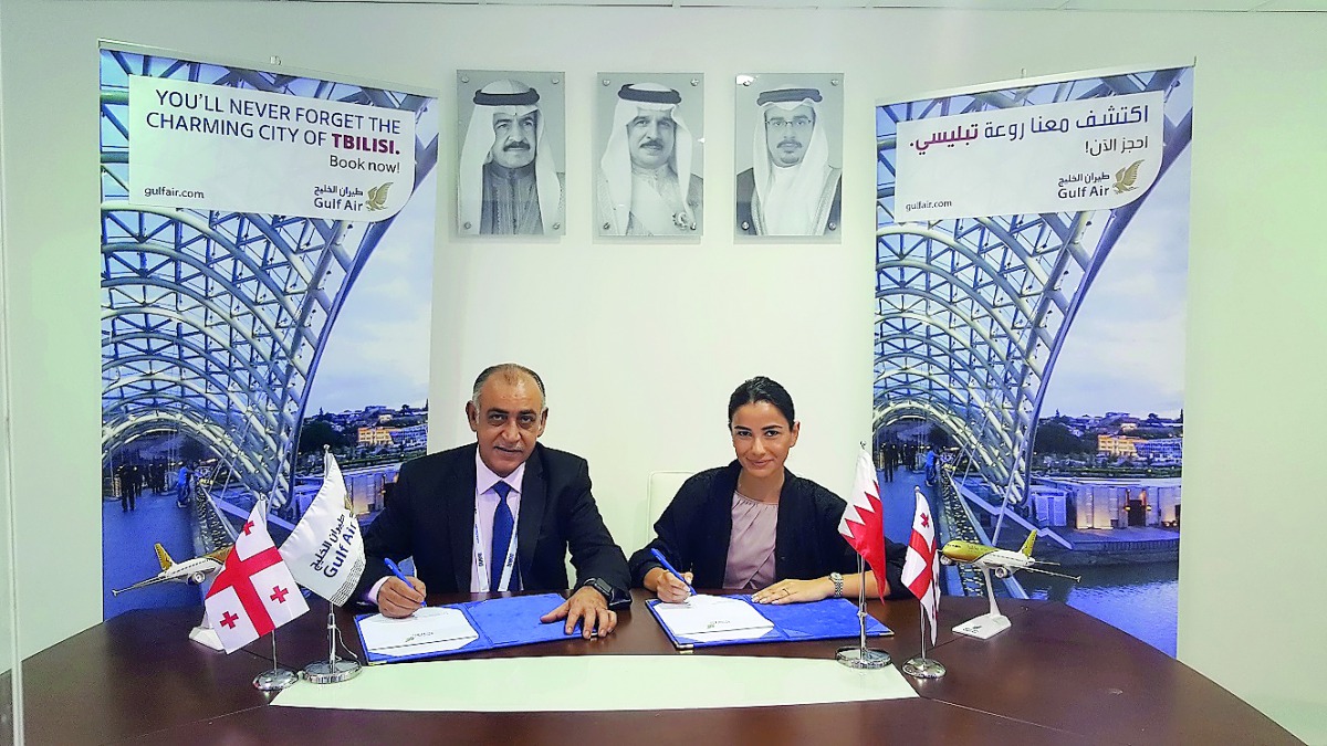 Ahmed Janahi, Gulf Air Chief Commercial Officer (left), and  Mariam Kvrivishvili, General Director at Voyager Ltd, at the signing ceremony.