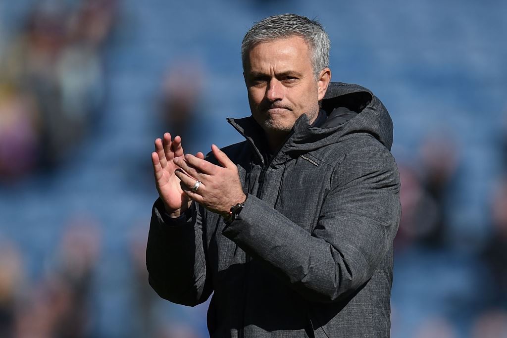 Manchester United's Portuguese manager Jose Mourinho applauds after the English Premier League football match between Burnley and Manchester United at Turf Moor in Burnley, north west England on April 23, 2017. AFP / OLI SCARFF 