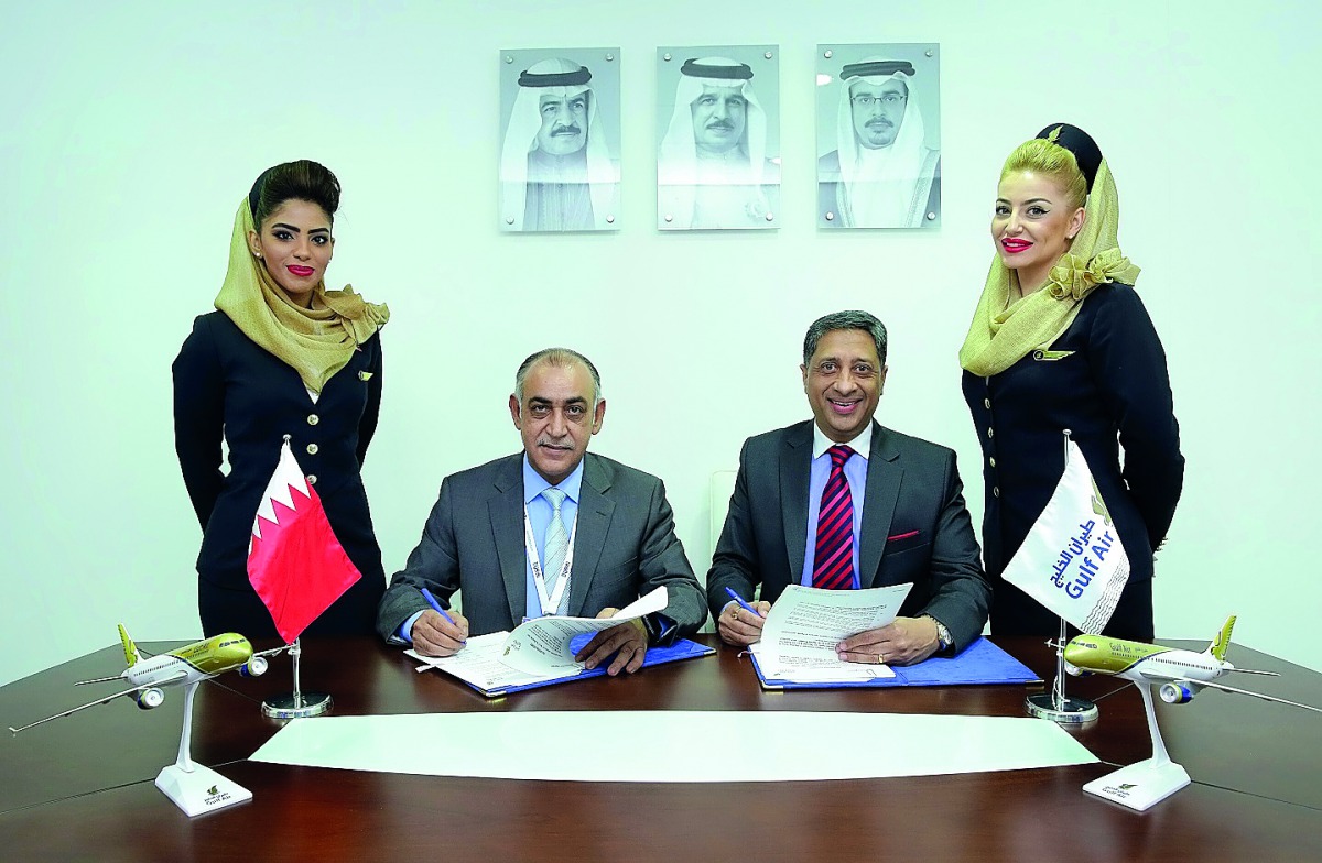 Ahmed Janahi (second left), Gulf Air Chief Commercial Officer and Vinay Malhotra (second right), Chief Operating Officer - Middle East and South Asia, VFS Global, at the signing ceremony in Dubai.