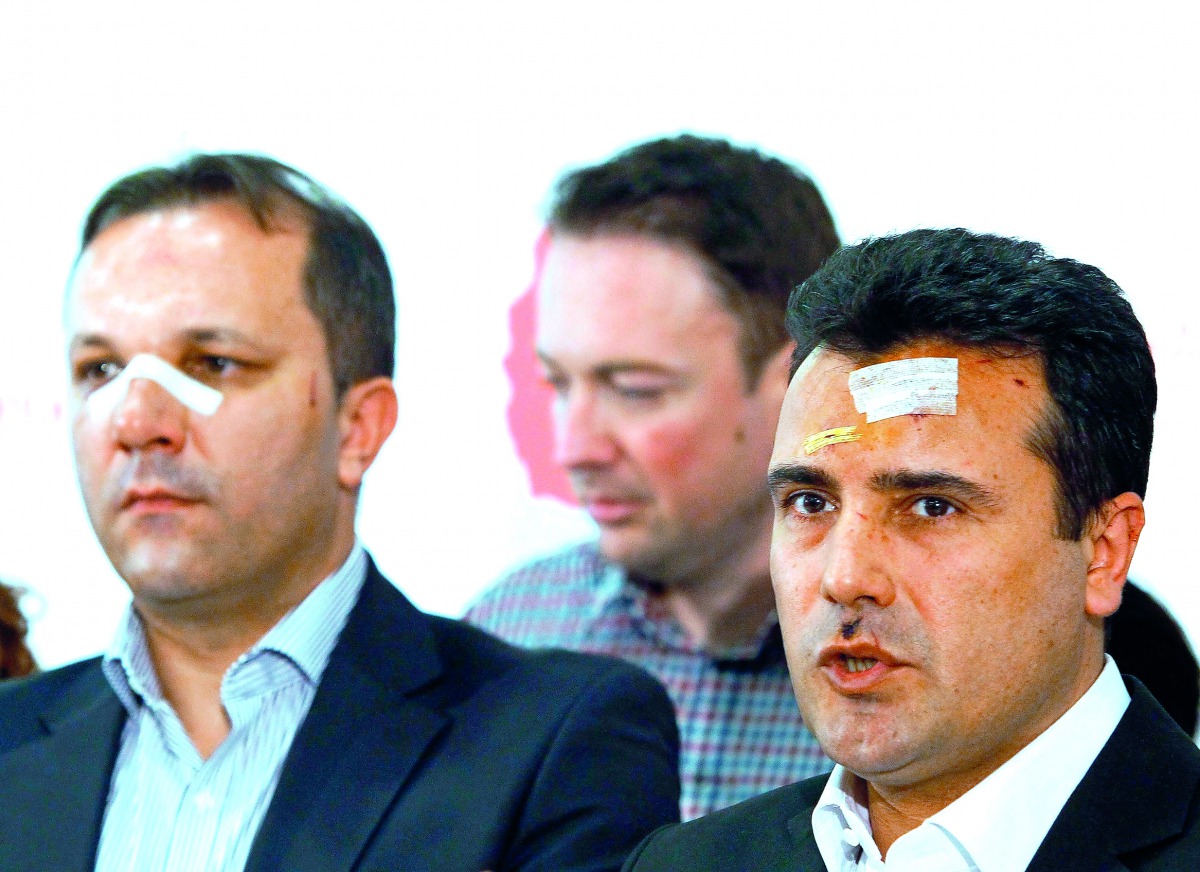 Macedonian Social Democratic leader Zoran Zaev (right) speaks during a news conference in Skopje