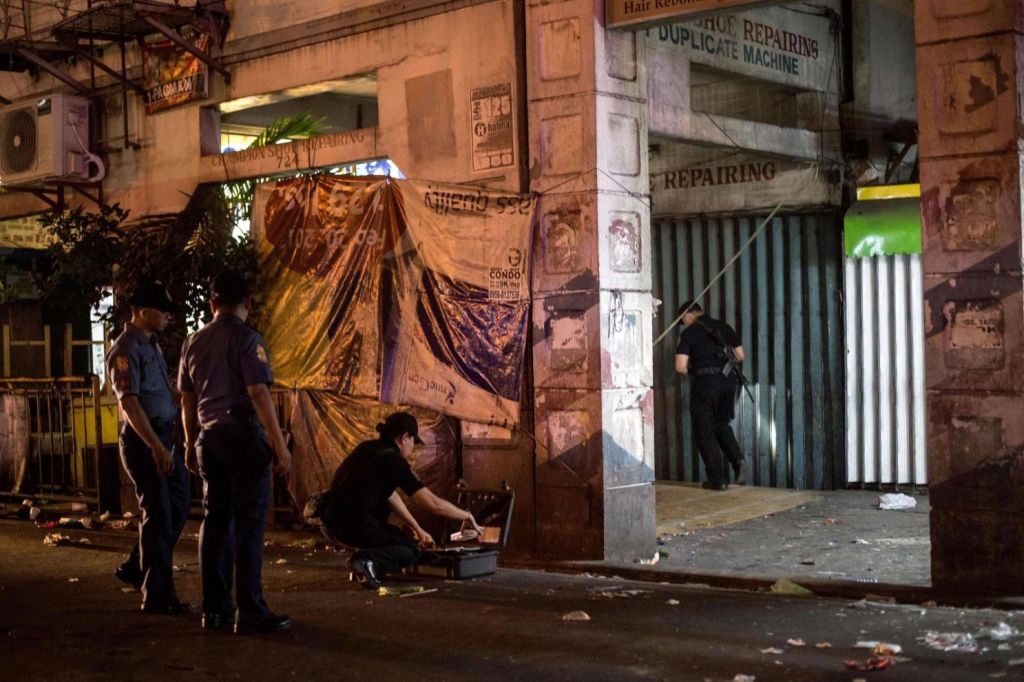 Fourteen people were wounded in a pipe bomb blast in Manila, Philippine police said Saturday, but authorities dismissed any link to an Asian leaders' meeting under way in the capital. PHOTO: AFP.