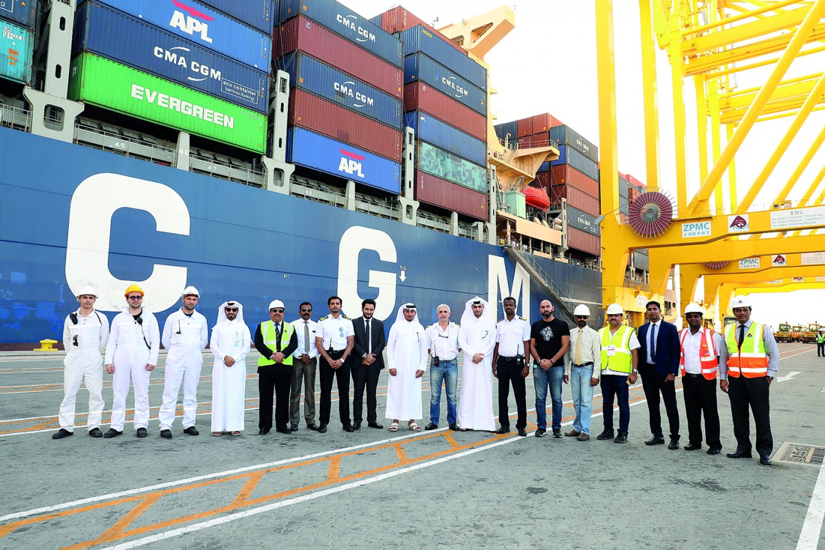 Hamad Ports management and Ocean Alliance officials pose for a group photo at Hamad Port, in Doha.