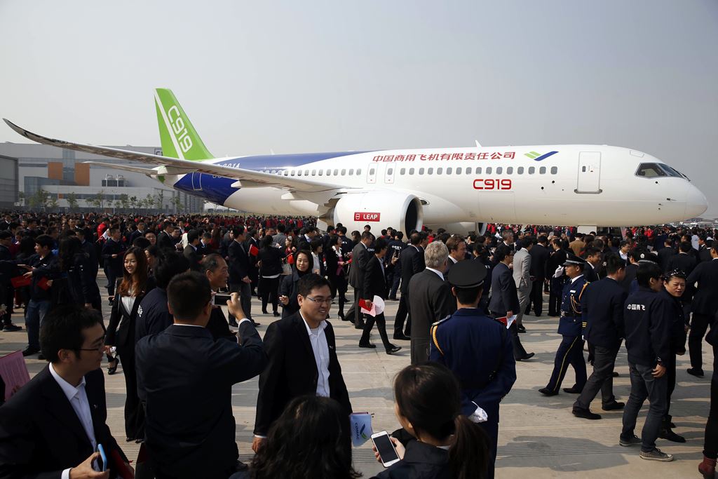 (FILES) This file photo taken on November 2, 2015 shows China's first big passenger plane, the C919, on display at a facility in commercial hub in Shanghai. AFP / STR 