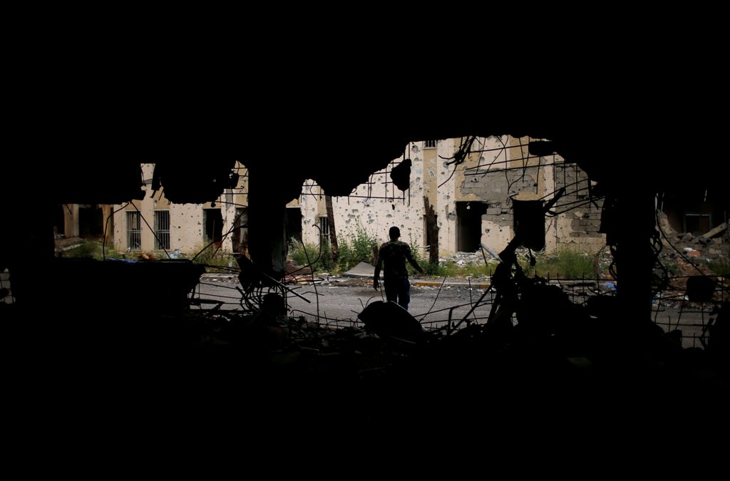 A member of Iraqi forces walks inside Al-Salam hospital destroyed during the fighting between Iraqi forces and Islamic State militants east of Mosul, Iraq May 2, 2017. REUTERS/Suhaib Salem