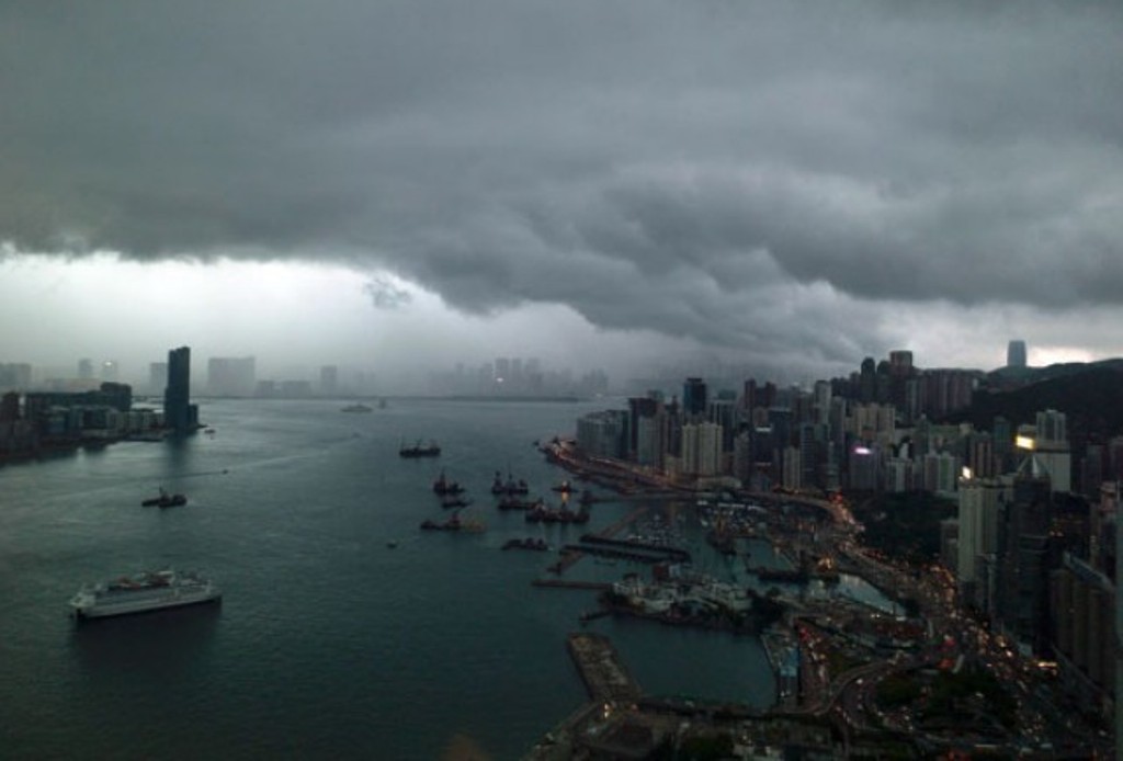 Clouds gather over the Hong Kong skyline on May 4, 2017. PHOTO: AFP.