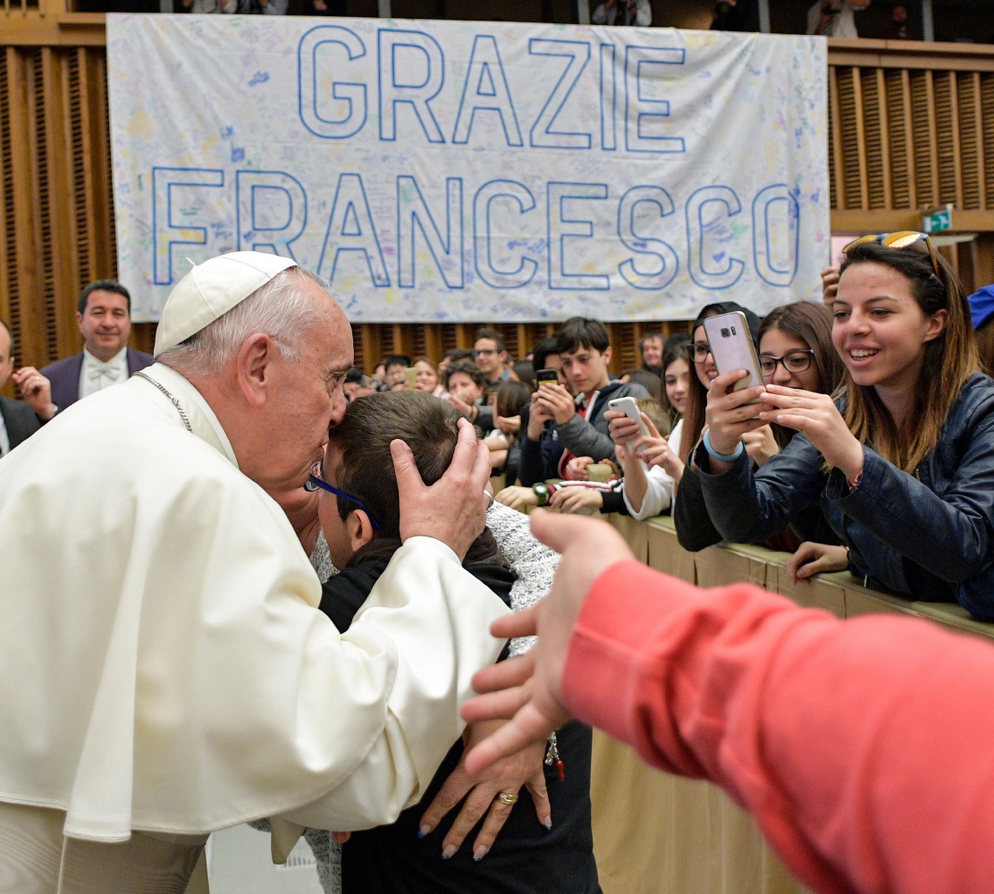 This handout picture released by the Vatican press office shows Pope Francis during an audience to participants in the meeting organized by the National Peace and Human Rights Coordination Unit at the Paul VI audience Hall on May 6, 2017 in Vatican.