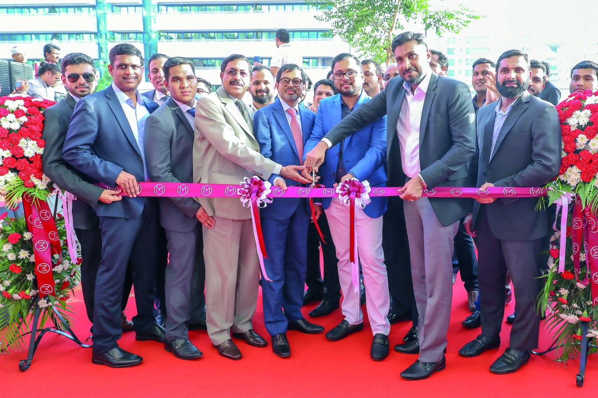 Malabar Gold & Diamonds officials during the opening of the new showroom in Al Rigga, Dubai. 