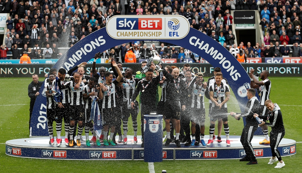 Newcastle celebrate winning the league with the trophy Action Images via Reuters / Lee Smith