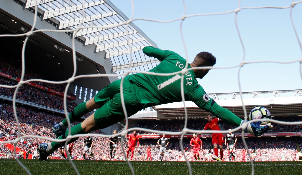 Liverpool's James Milner has his penalty saved by Southampton's Fraser Forster Reuters / Phil Noble  
