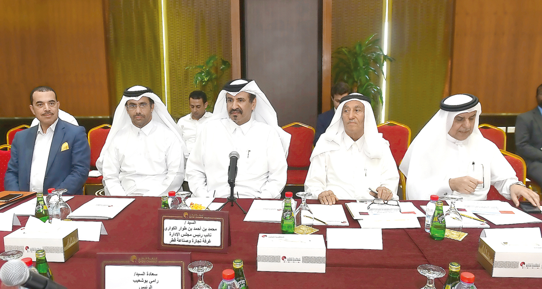 Mohammed bin Ahmed bin Towar Al Kuwari (third left), Vice Chairman, Qatar Chamber; and  Rami Bouchaib (left),  Chairman, CIME along with other officials at the business meeting, yesterday. Pic / Syed Omar