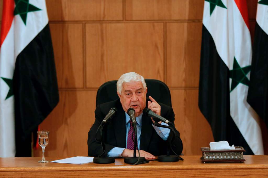 Syrian Foreign Minister Walid Muallem speaks during a press conference in the capital Damascus on May 8, 2017.   AFP / Louai Beshara
