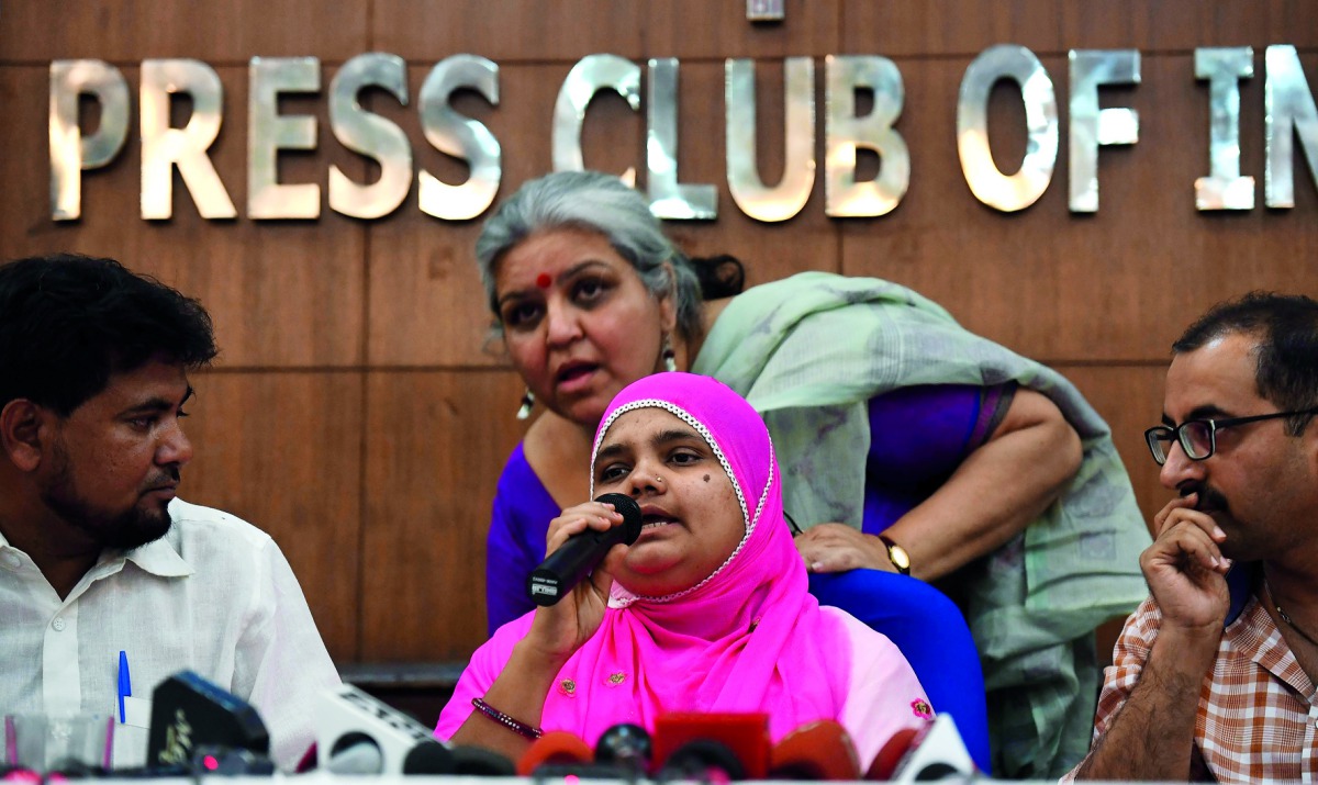 Bilkis Bano addressing a press conference in New Delhi, yesterday.