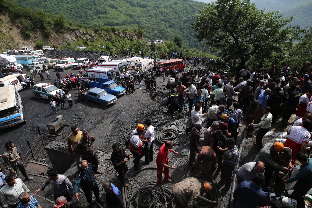 GOLESTAN, IRAN - MAY 3 : Iranian emergency personnel and mine workers gather around the Azadshahr coal mine in northern Iran, Golestan on May 3, 2017. Media reported that at least 35 workers died after the incident. ( Stringer - Anadolu Agency ).