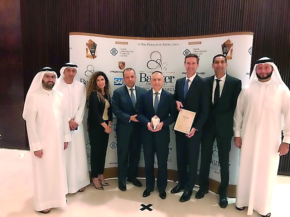 Officials of Investcorp posing for a group photo with the organisers after winning the ‘Best Private Equity firm in MENA 2017’ award held in Dubai recently.