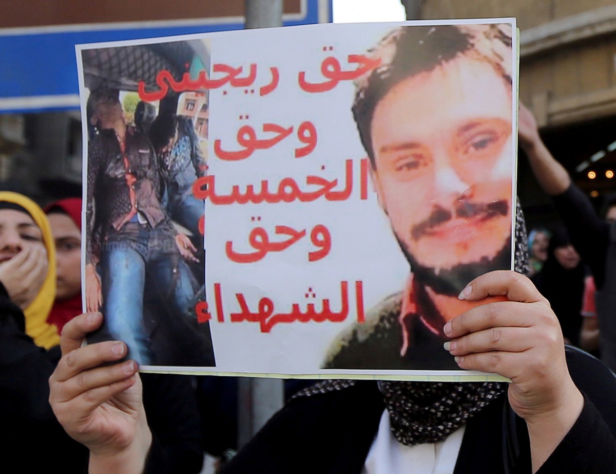 FILE PHOTO: Egyptian activists holds a poster calling for justice for Giulio Regeni during a demonstration in Cairo, April 15, 2016 (Reuters) 