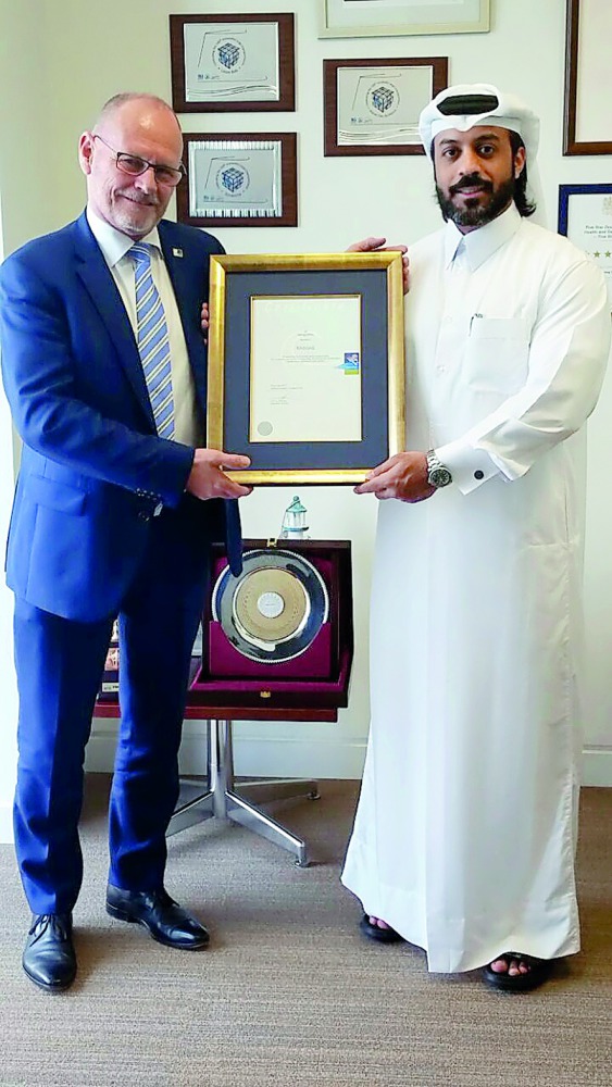 
Jan Fransen (left), Executive Director of Green Award Foundation, with Talal Al Tamimi, Shipping Manager at RasGas Company Limited, receiving the Green Award certification on behalf of RasGas for its commitment to safety, quality and high environmental 