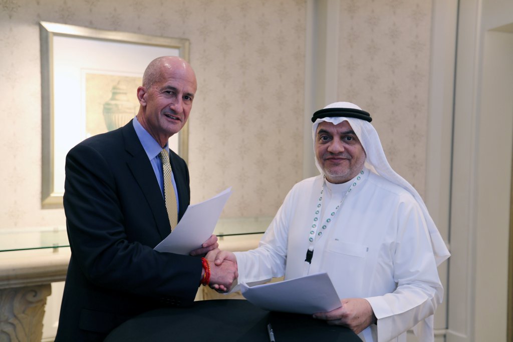 Vice Chairman of General Electric, John Rice and Saudi Governor of Small & Medium Enterprises, Ghassan Ahmed Al Sulaiman pose for photos after signing their agreements at the Saudi-US CEO Forum 2017 ahead of the arrival of the U.S. President Donald Trump,