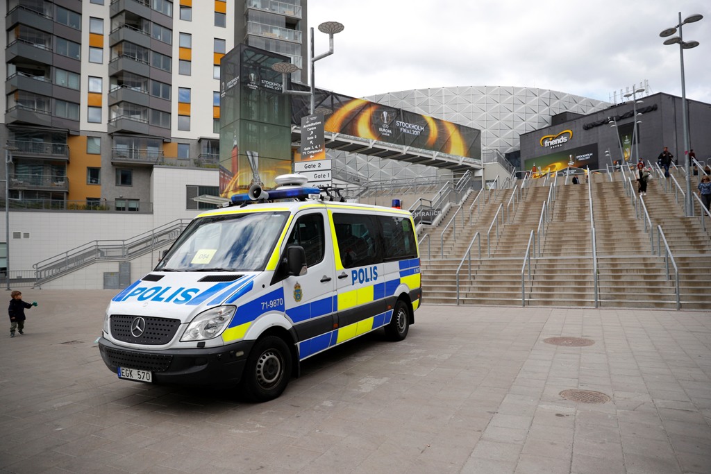 General view of a police van outside the stadium ahead of the Europa League final. Reuters / Phil Noble