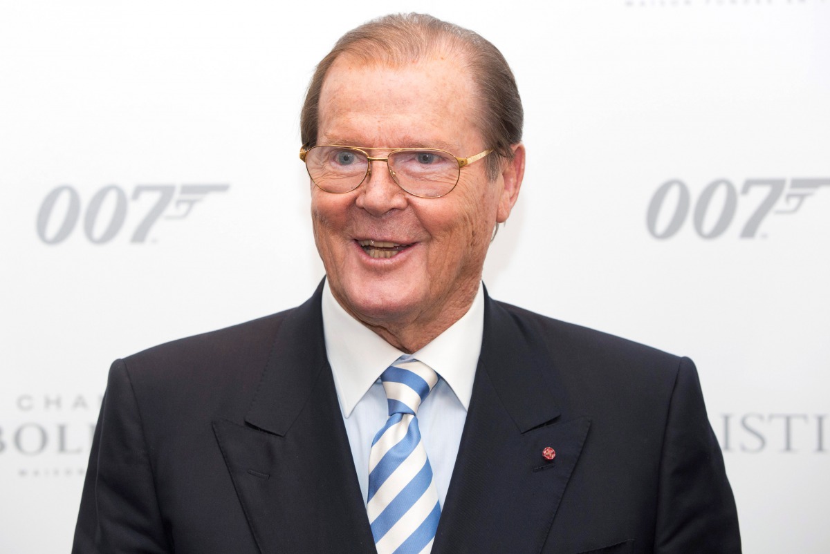 Actor Sir Roger Moore attends the 50 Years of James Bond Auction at Christies in London, October 5, 2012. (REUTERS/Neil Hall/File Photo)