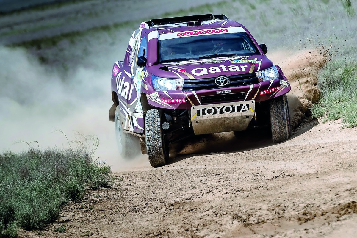 Qatar's Nasser Saleh Al Attiyah and his navigator Matthieu Baumel of Toyota Hilux Overdrive team in action during the third stage of Rally Kazakhstan yesterday.
