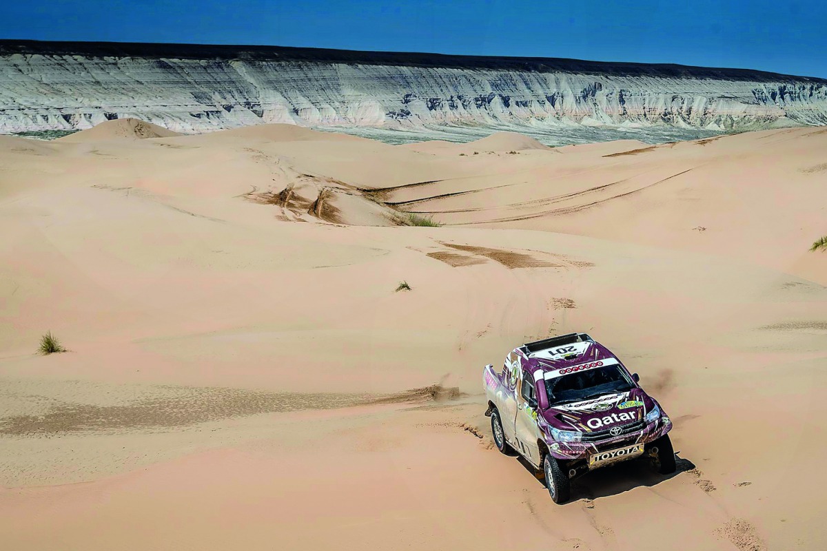Qatar's Nasser Saleh Al Attiyah and his navigator Matthieu Baumel of Toyota Hilux Overdrive team in action during the fourth stage of Rally Kazakhstan.
