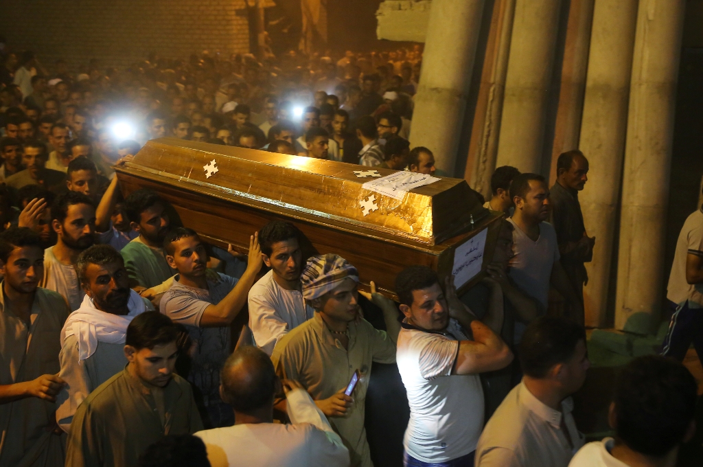 People attend the funeral ceremony held for eight victims of the Saint Samuel's Monastery attack in Egypt’s southern Minya province, Cairo, Egypt on May 26, 2017.  Ahmed Al Sayed - AA
