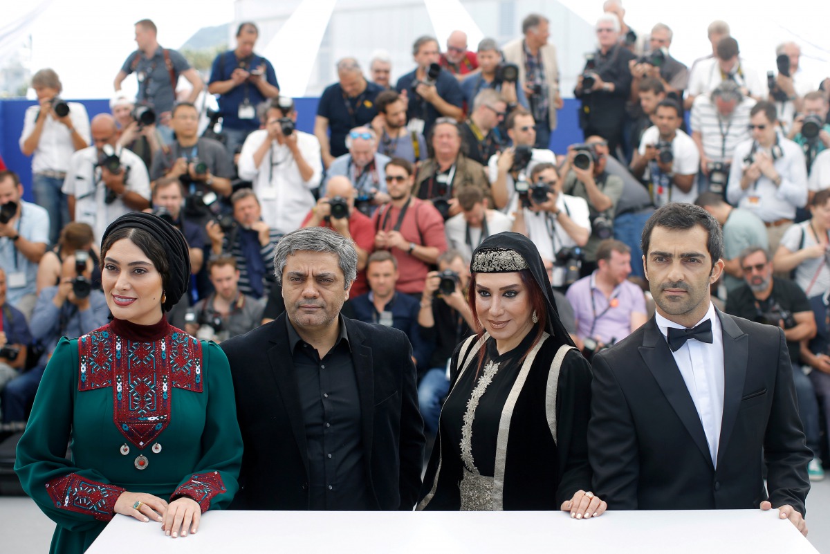 Iranian director Mohammad Rasoulof, cast members Nasim Adabi, Mohammad Akhlaghirad and Soudabeh Beizaee pose for a picture at 70th Cannes Film Festival on  May 19, 2017. Reuters / Stephane Mahe



