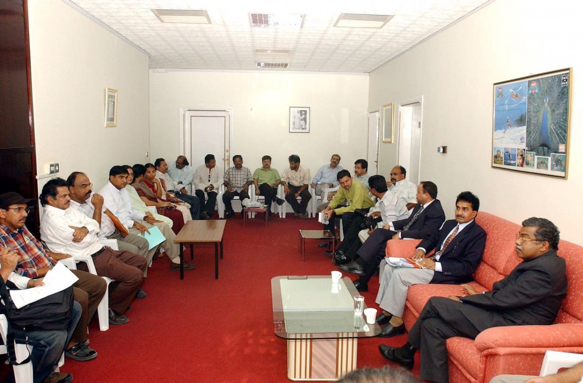 File photo of George Joseph (extreme right) sitting with one of those Open Houses at Indian Embassy