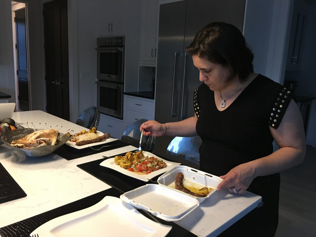 Strapped for time at the end of the day, the author dishes takeout for iftar on the sixth night of Ramadan. (Akkad family photo)