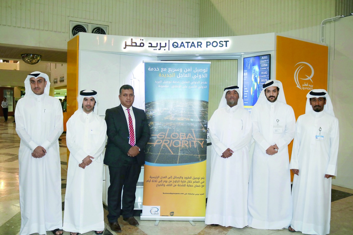Officials at the launch of Global Priority service of Qatar Post.