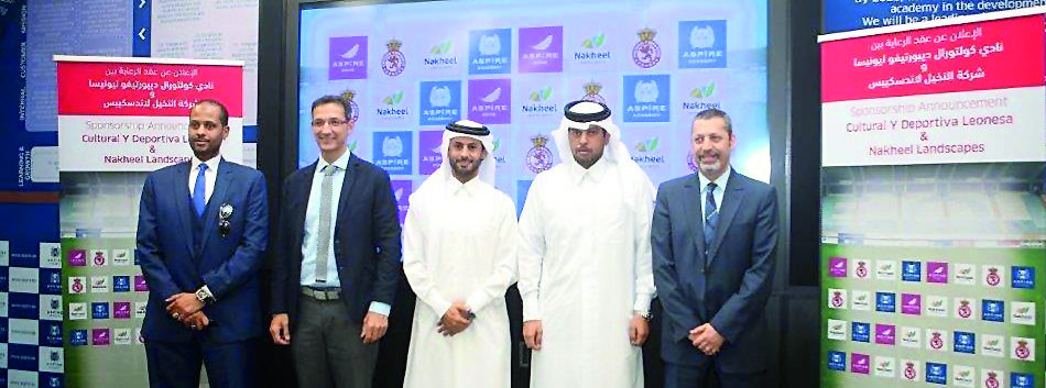Officials of Aspire Zone Foundation, Cultural y Deportiva Leonesa and  Nakheel Landscapes pose for a picture after signing a sponsorship agreement in Doha yesterday.