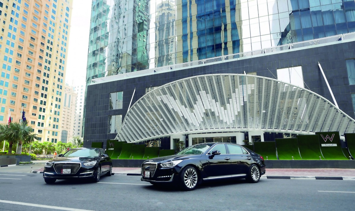 Genesis G90 and Genesis G90 limousine models for VIP guests seen parked outside the W Doha Hotel & Residences, in West Bay.