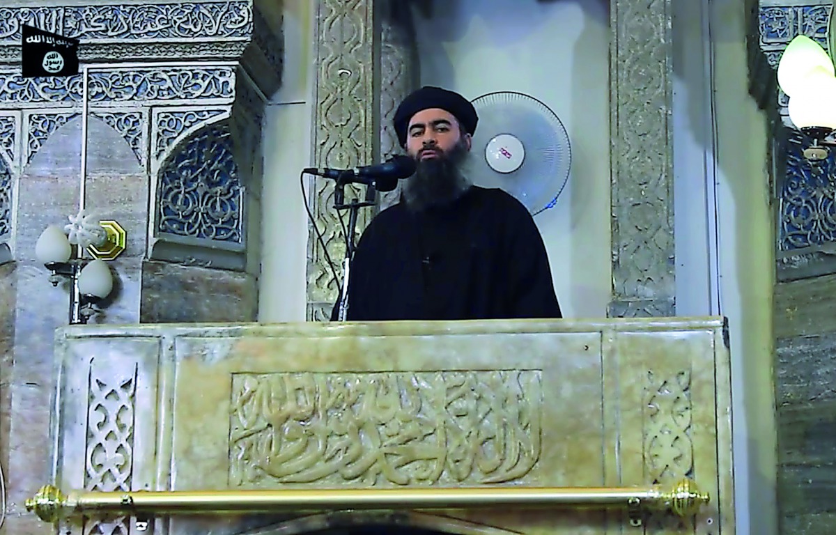 This file image shows Abu Bakr Al Baghdadi adressing worshippers at a mosque in Mosul.  
