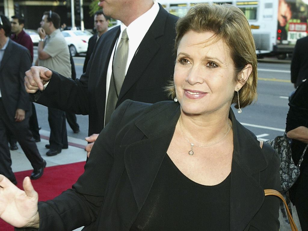 (FILES) This file photo taken on June 10, 2004 shows actress Carrie Fisher attends the premiere of the MGM film 