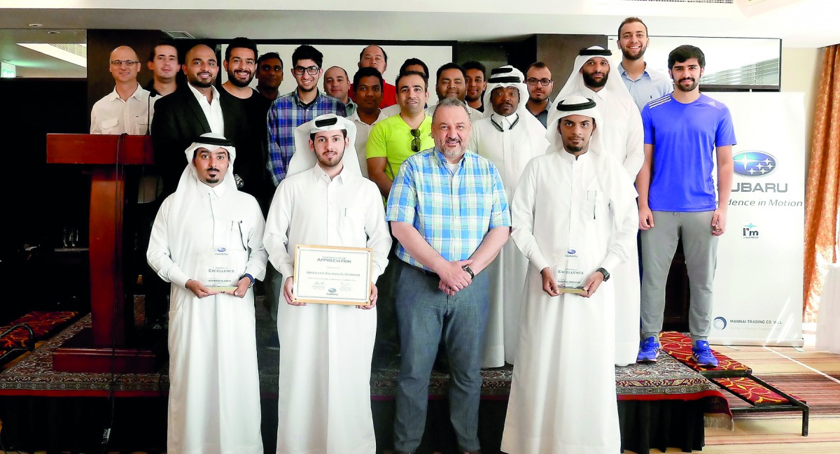 Winners of the  '2017 Qatar National Rally' posing for a group photo.
