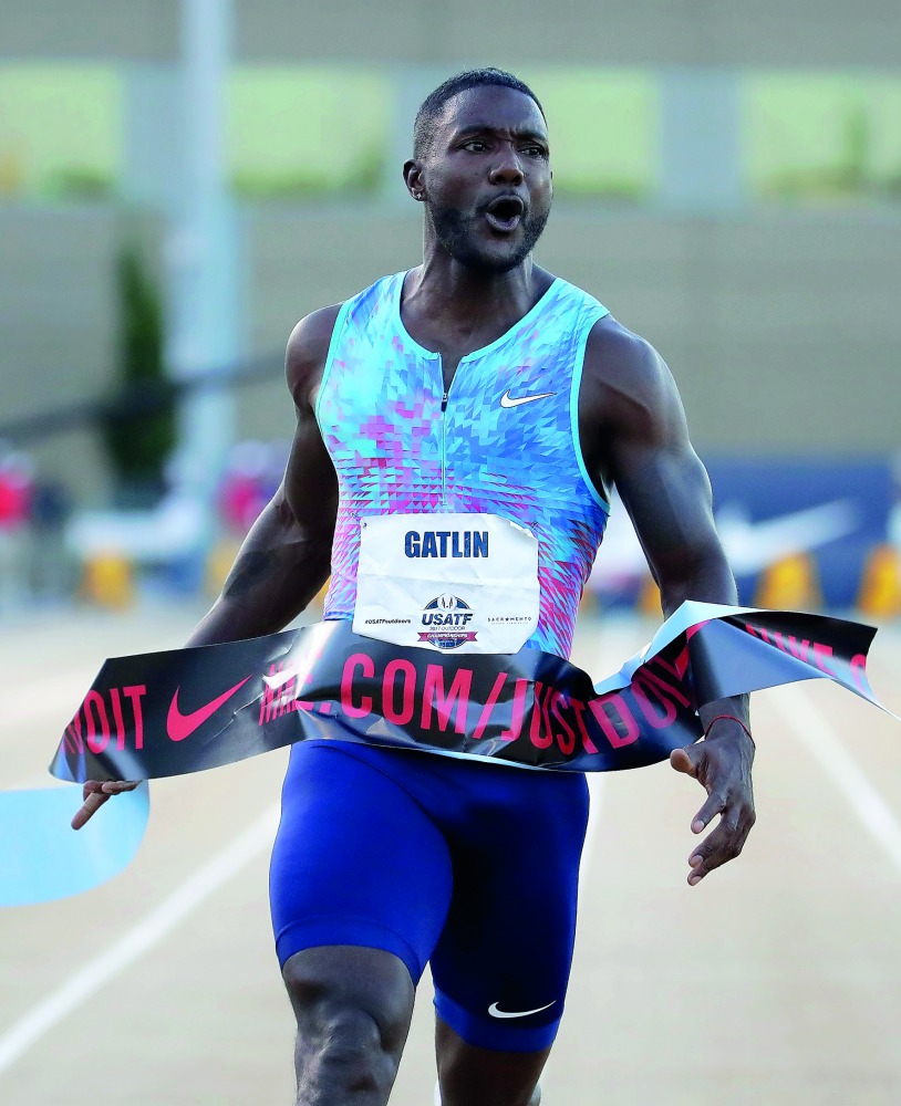 Justin Gatlin celebrates as he win the Men's 100 Meter Final during Day 2 of the 2017 USA Track & Field Championships at Hornet Satdium in Sacramento, California on Friday.