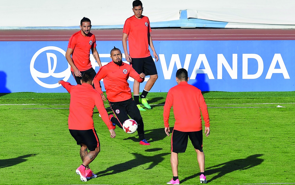 Chile's forward Arturo Vidal (centre) attends a training session with team-mates at the Central Stadium yesterday in Kazan on the eve of their 2017 FIFA Confederations Cup football semi-final match against Portugal.