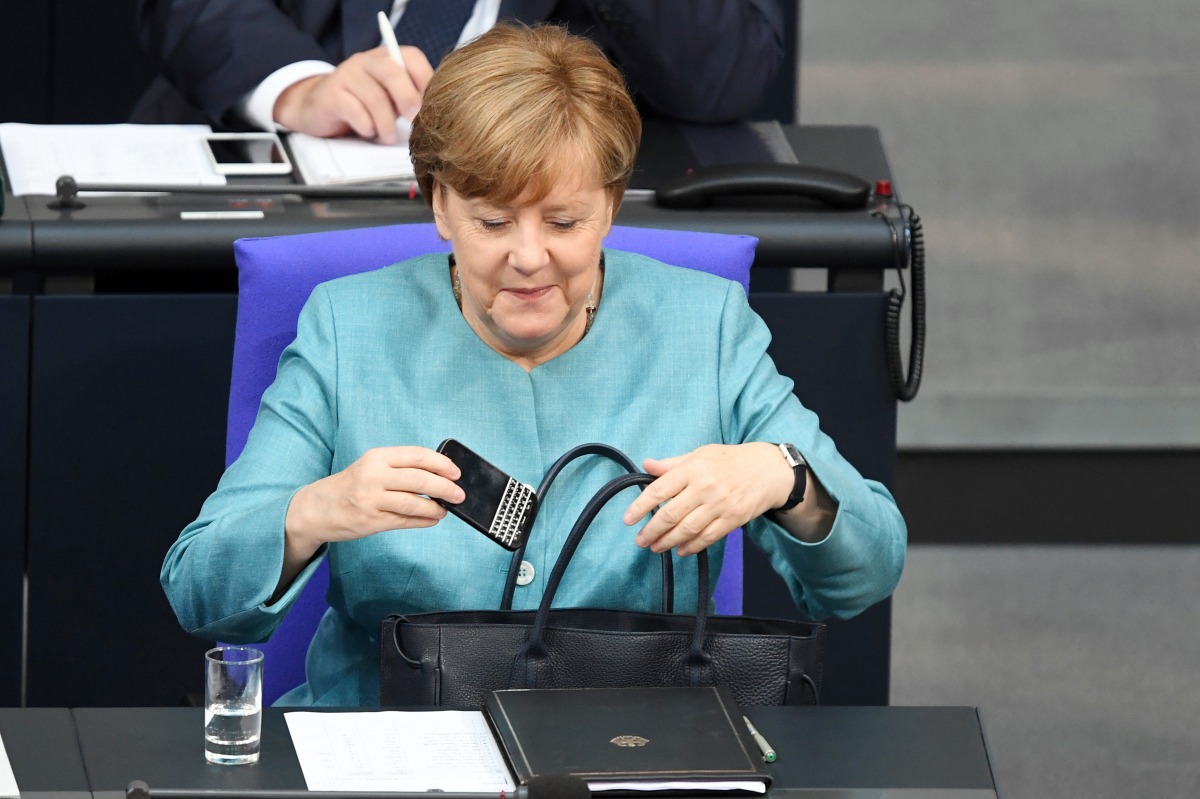 German Chancellor Angela Merkel arrives to make her speech regarding last week's EU Summit and the upcoming G-20 Summit at the German parliament Bundestag in Berlin, Germany on June 29, 2017. (Maurizio Gambarini - Anadolu Agency)